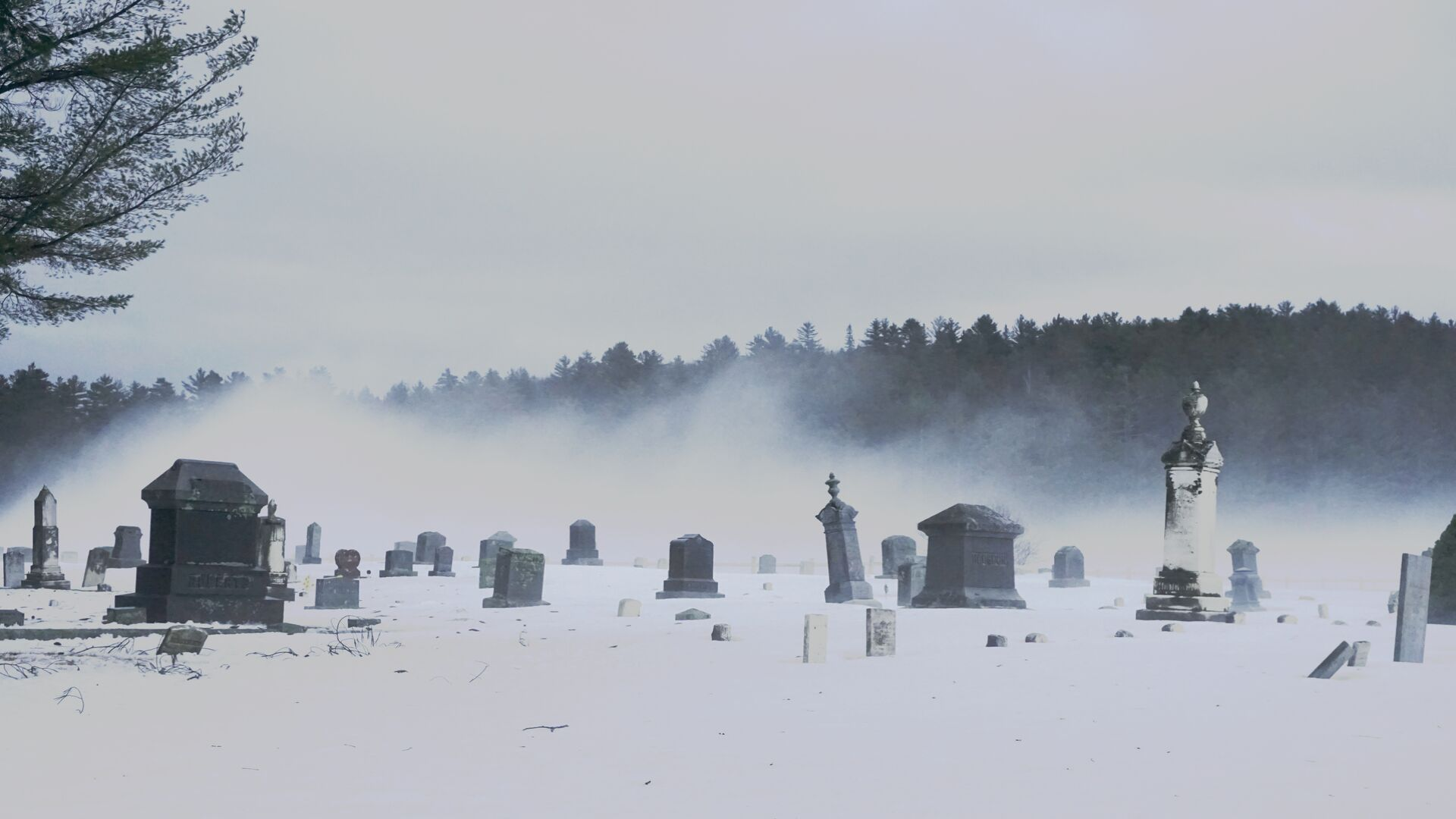Photo of a cemetery under snow