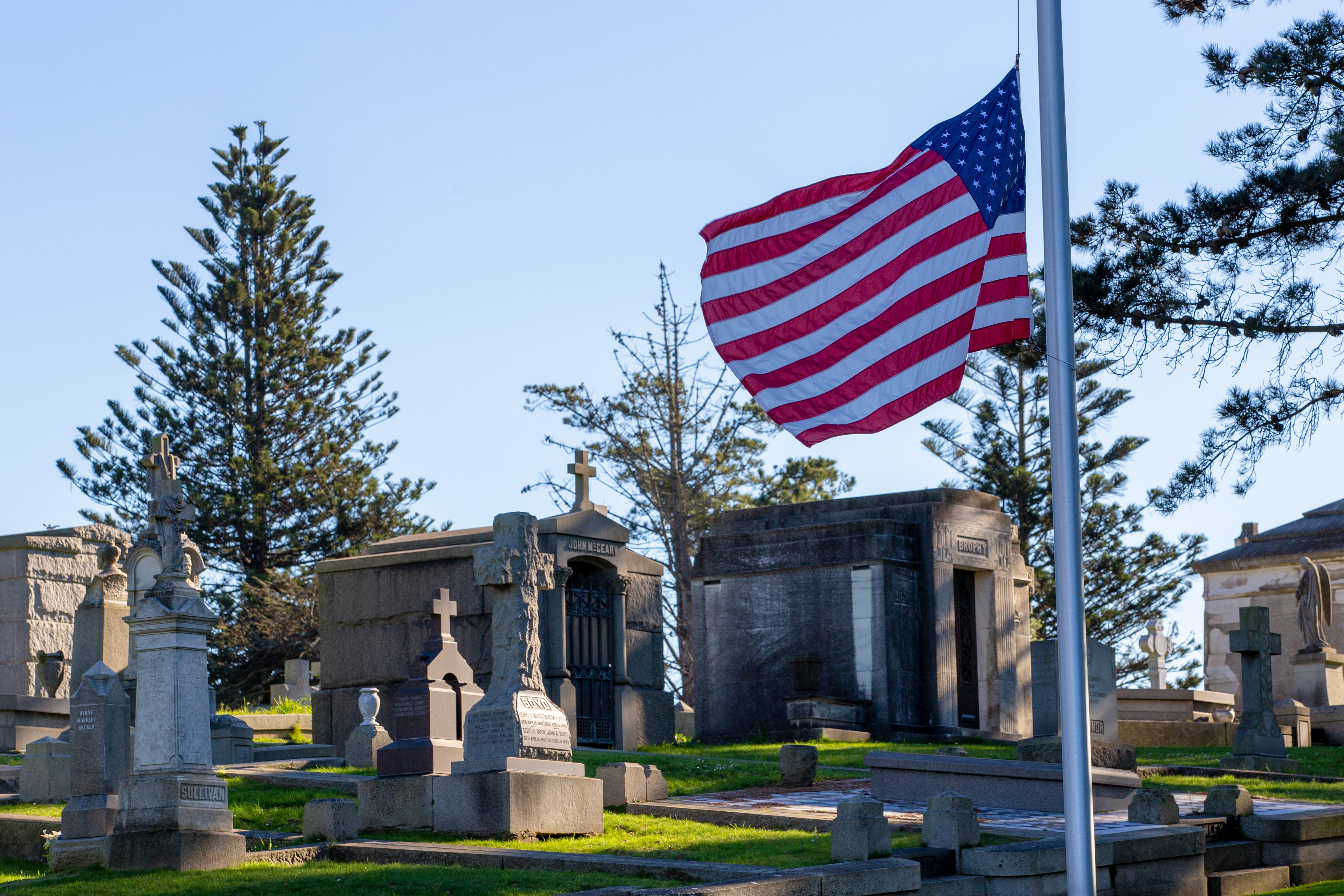 Photo of an American flag in a cemetery